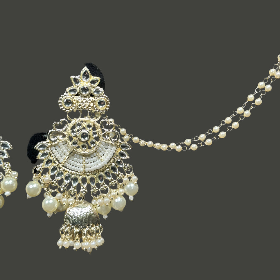 white and gold earrings with mangtika also with bahobali
