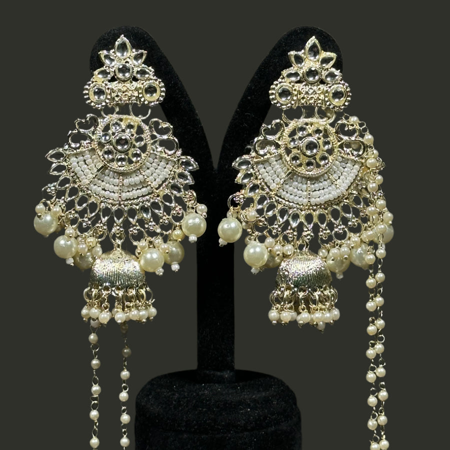 white and gold earrings with mangtika also with bahobali