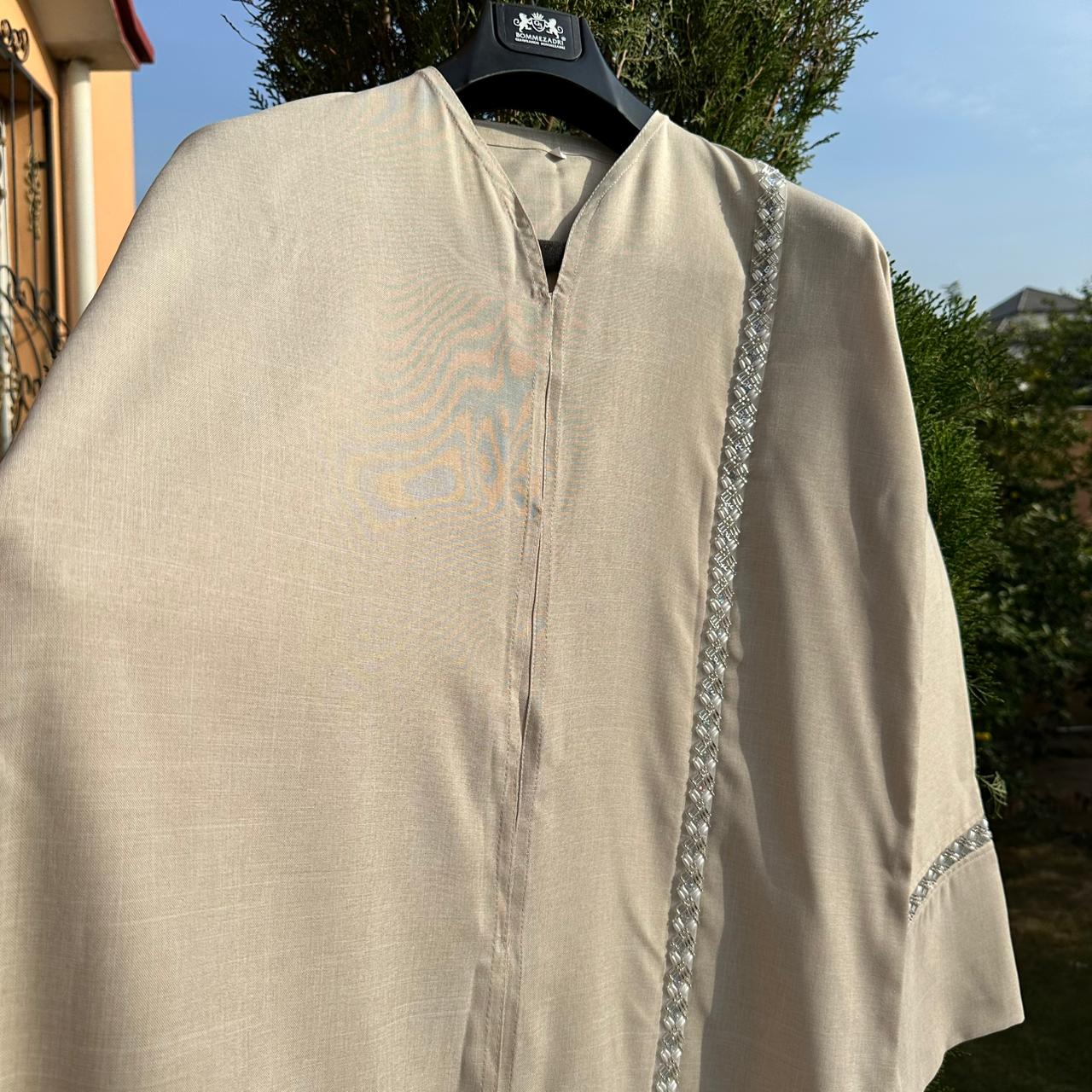 Elegant beige Abaya with pink scarf