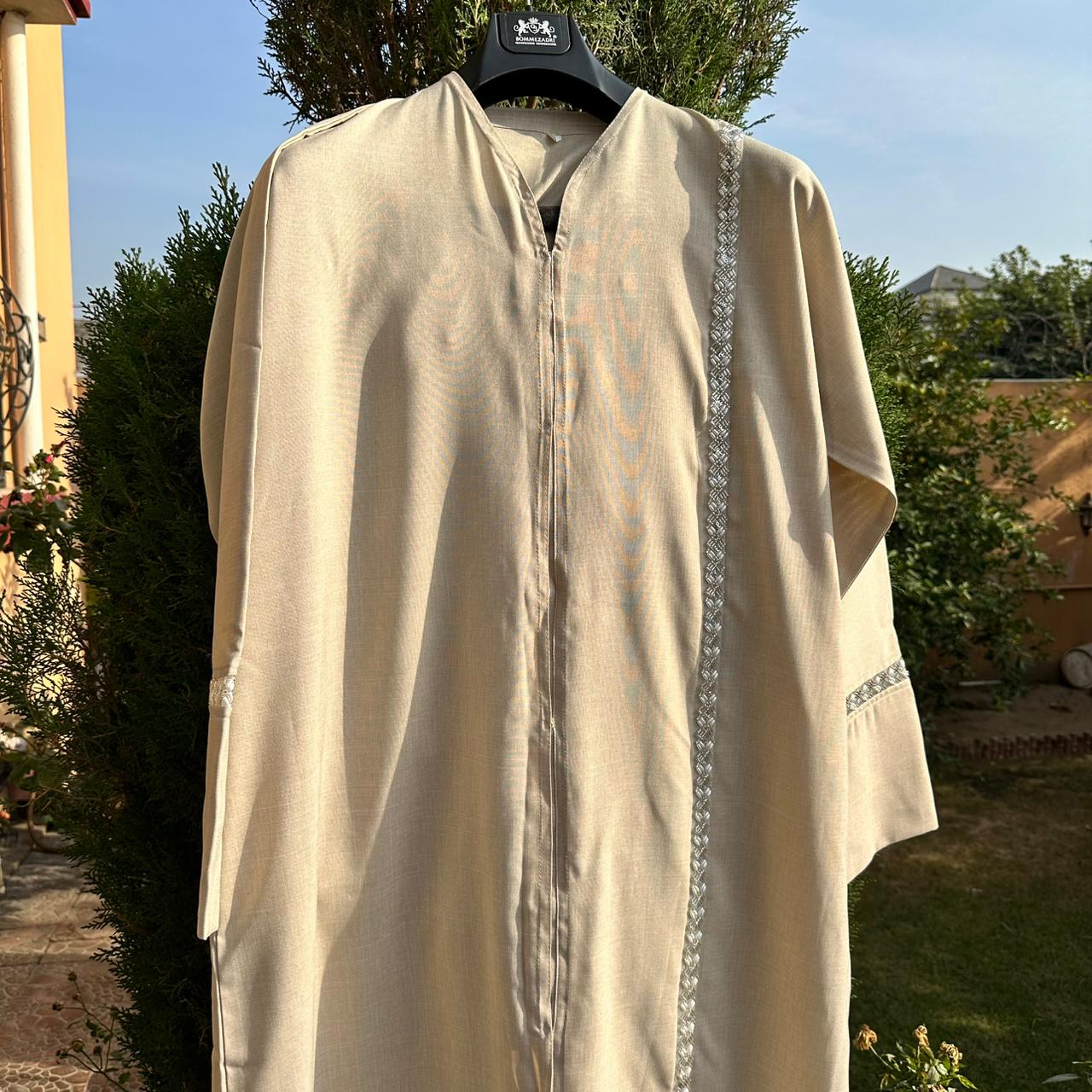 Elegant beige Abaya with pink scarf
