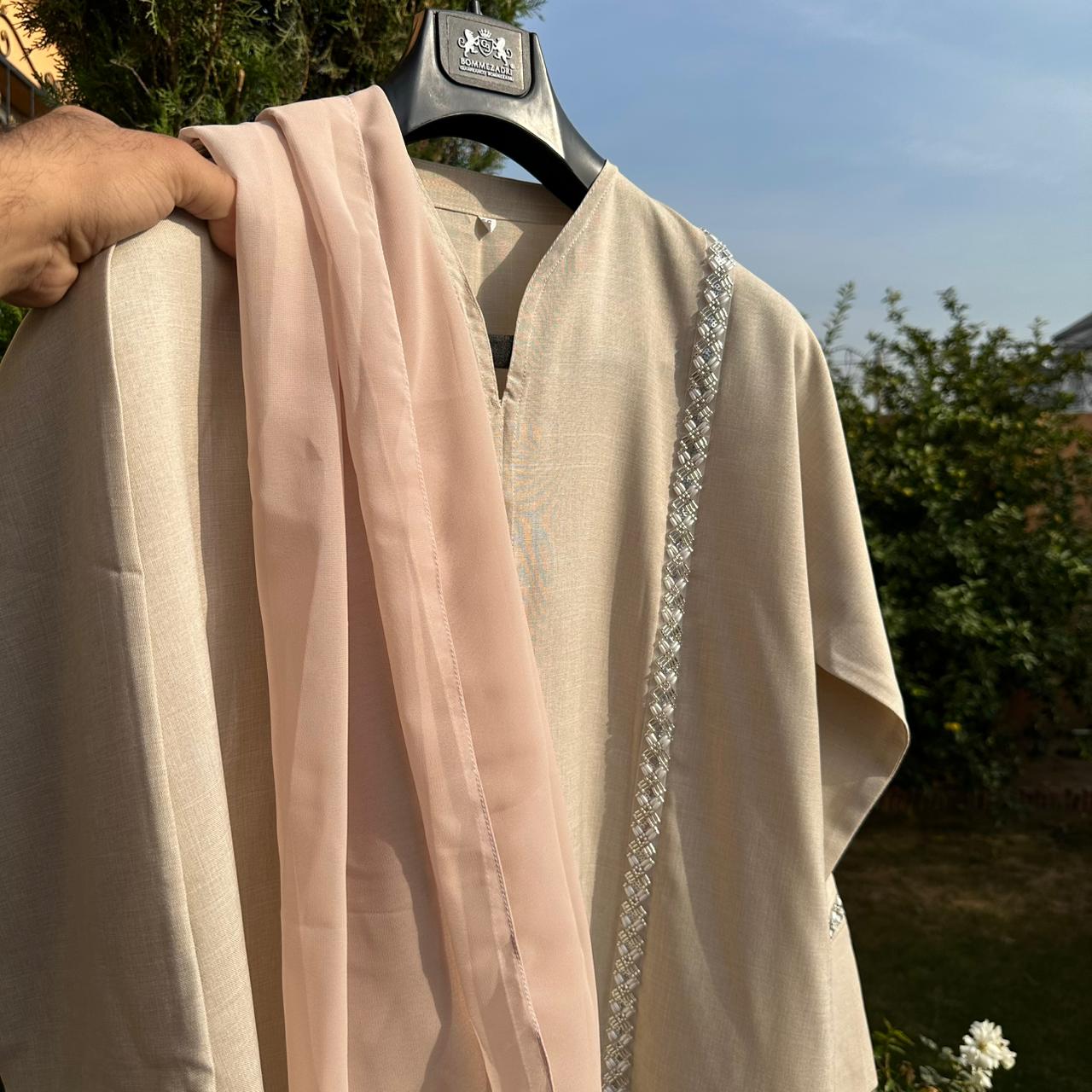 Elegant beige Abaya with pink scarf